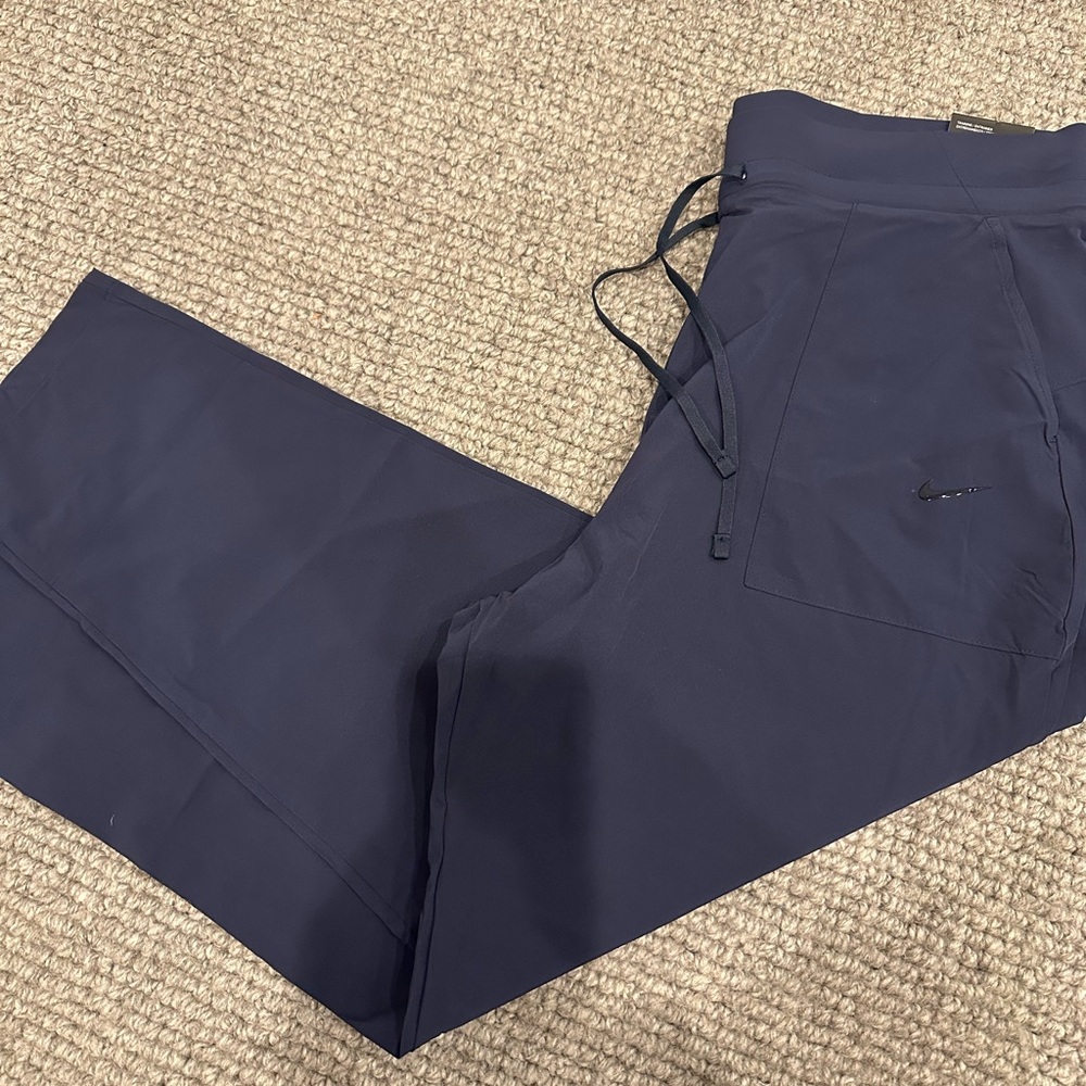 Nike Women’s Dri-Fit navy bliss luxe pant, never worn new with tags.